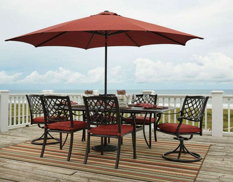 Tanglevale Burnt Orange Dining Set With Umbrella 4 Chairs 2 Swivel Chairs Nc Gallery Furniture